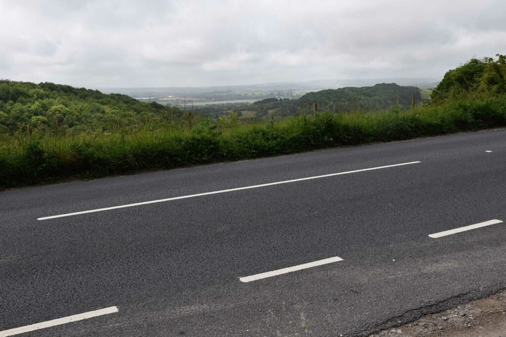 photo showing a road map with asphalt